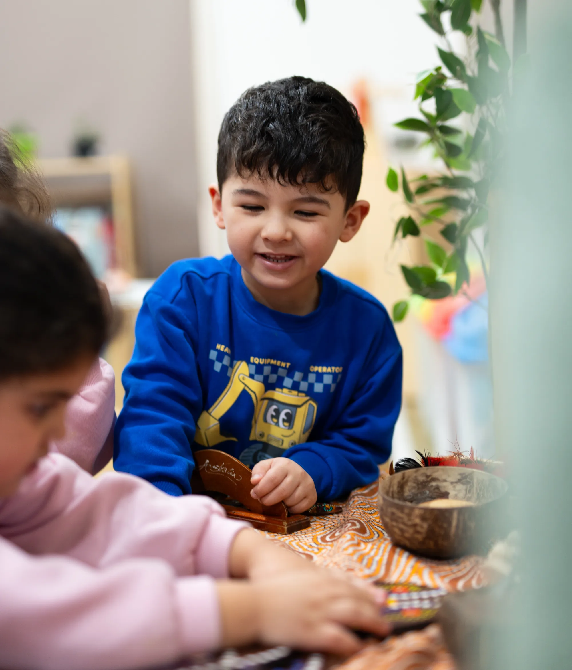 Children eating together indoors at Fairfield